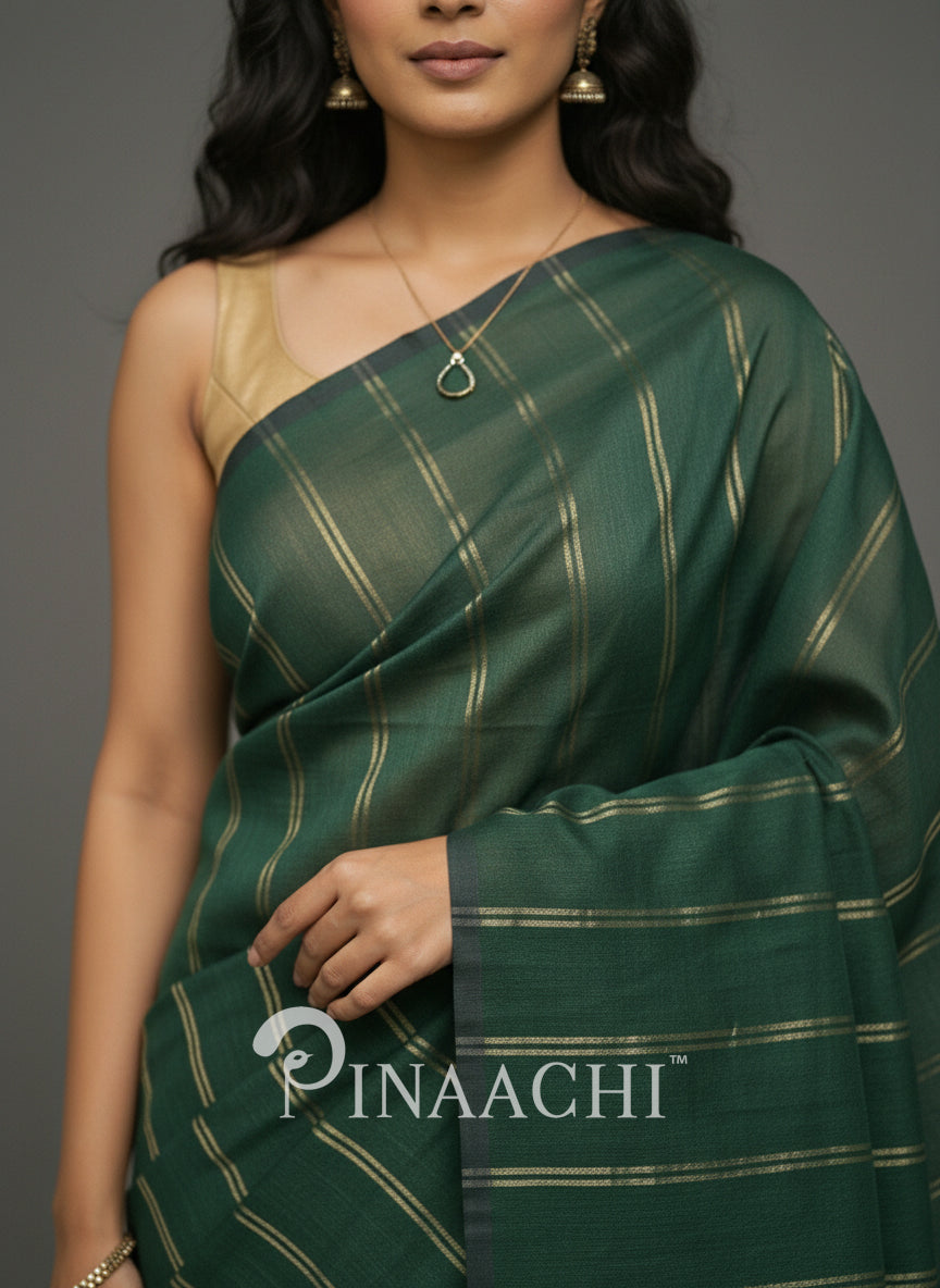 Pinaachi handloom bottle green saree with gold striped pattern in lightweight fabric