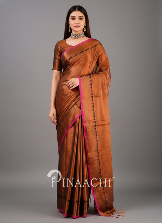 Elegant handloom copper tissue silk saree with rich texture and contrasting border from Pinaachi