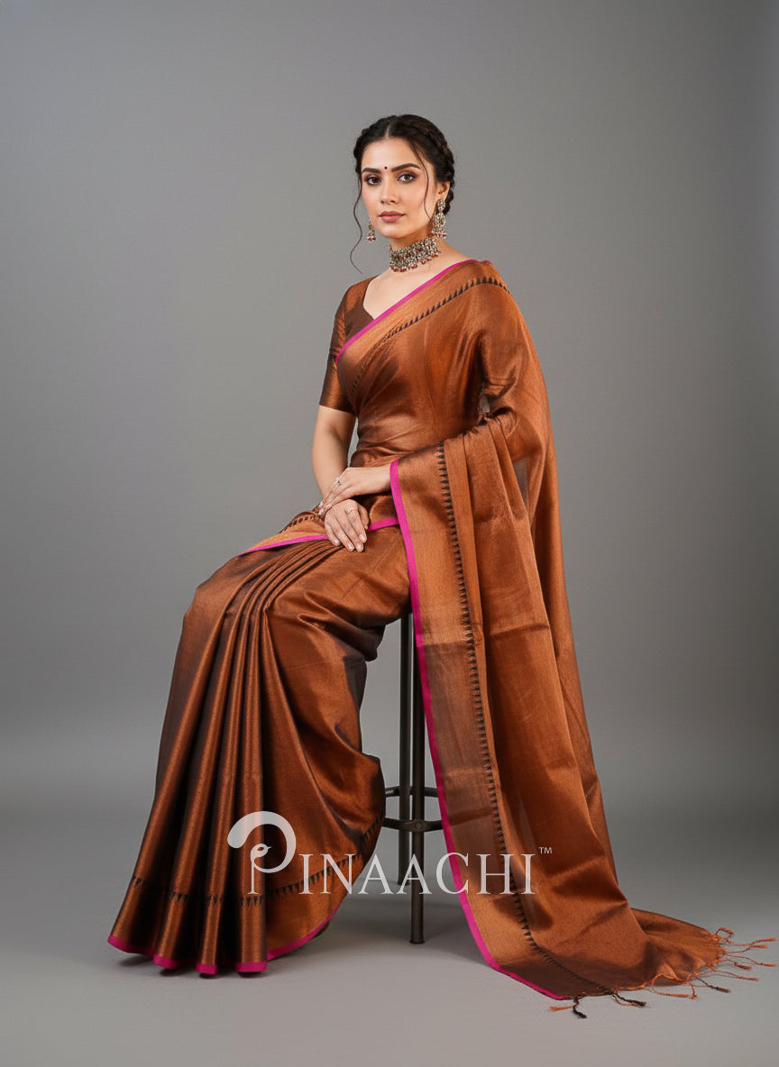 Elegant Pinaachi handloom copper tissue silk saree with pink accents, perfect for festive occasions