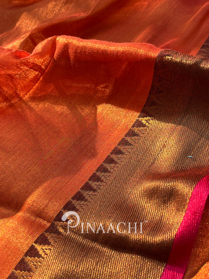 Handloom copper tissue silk saree in vibrant orange with intricate border detailing