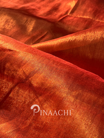 Handloom copper tissue silk saree by Pinaachi with rich, shimmering textures and vibrant colors