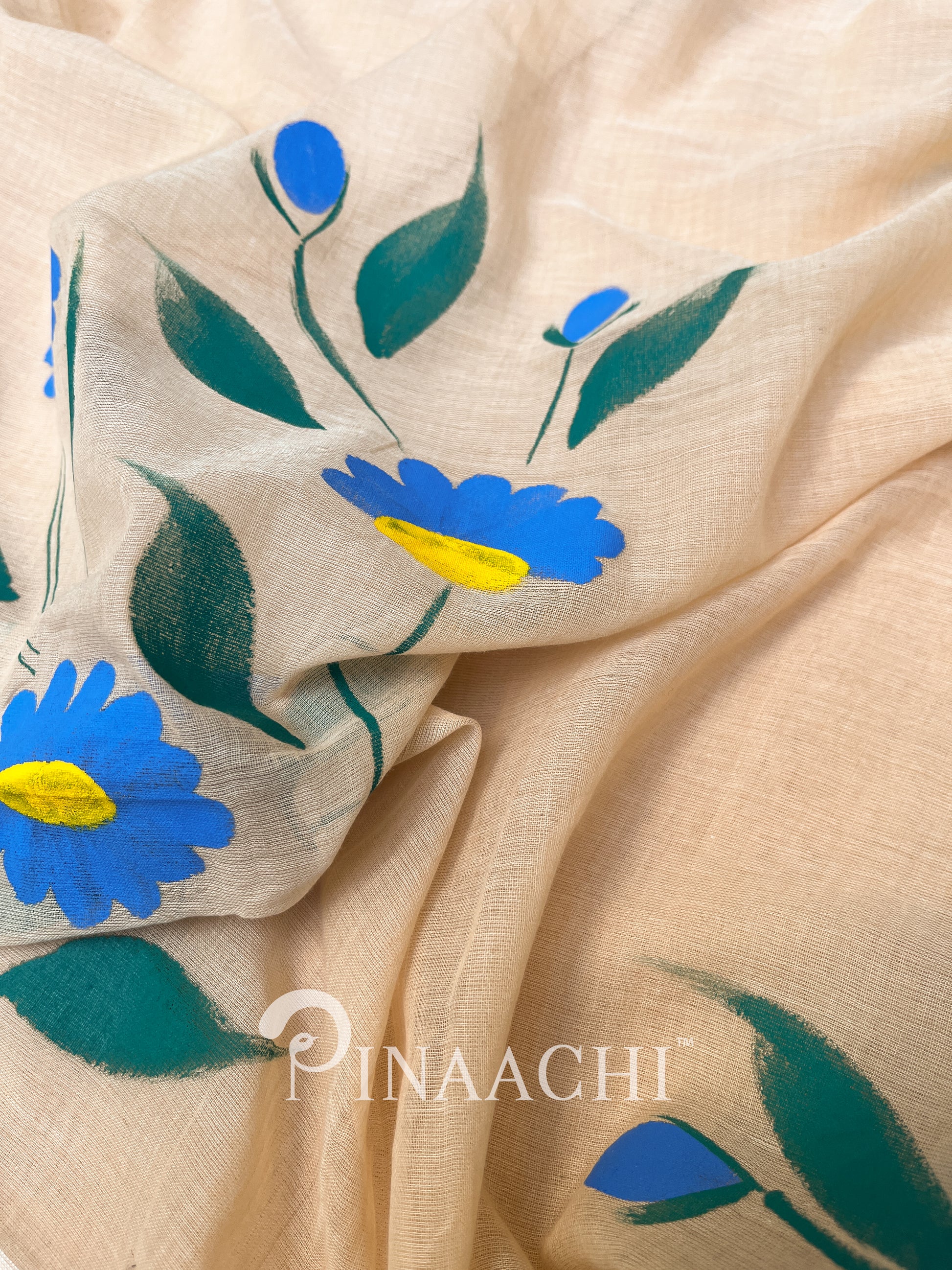 Pinaachi handloom handpainted mulmul saree in beige with blue floral designs