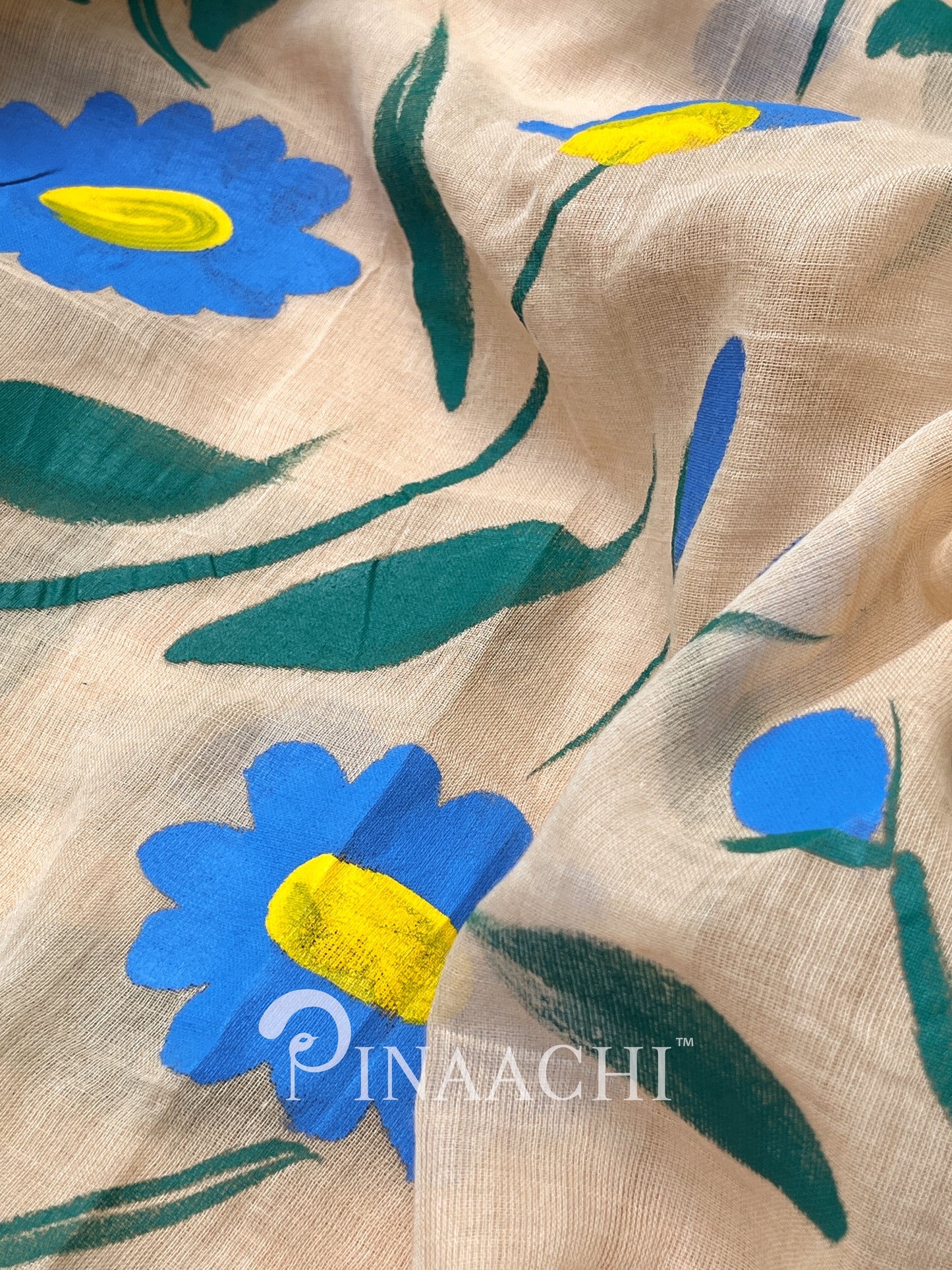 Pinaachi beige handloom handpainted mulmul saree with vibrant blue and yellow floral design