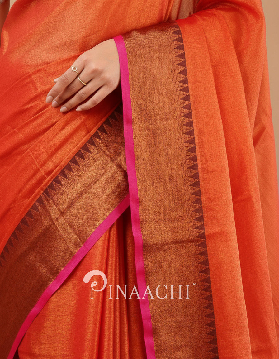 Elegant handloom orange red tissue silk saree by Pinaachi with intricate border design
