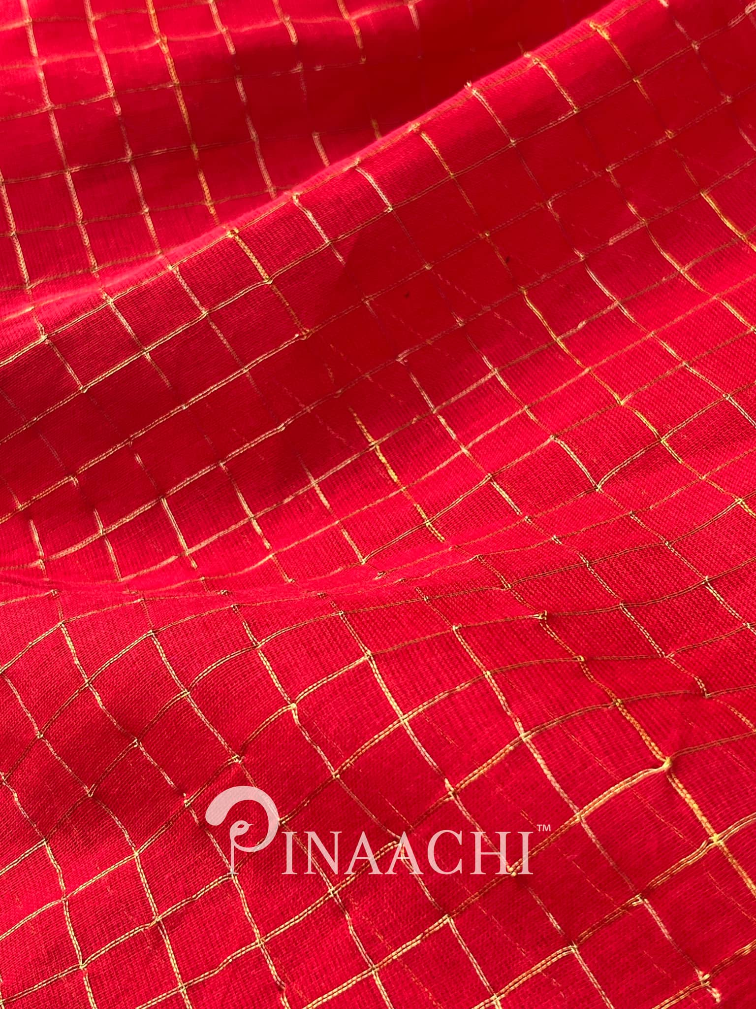 Pinaachi handloom red checked mulmul saree with intricate golden detailing