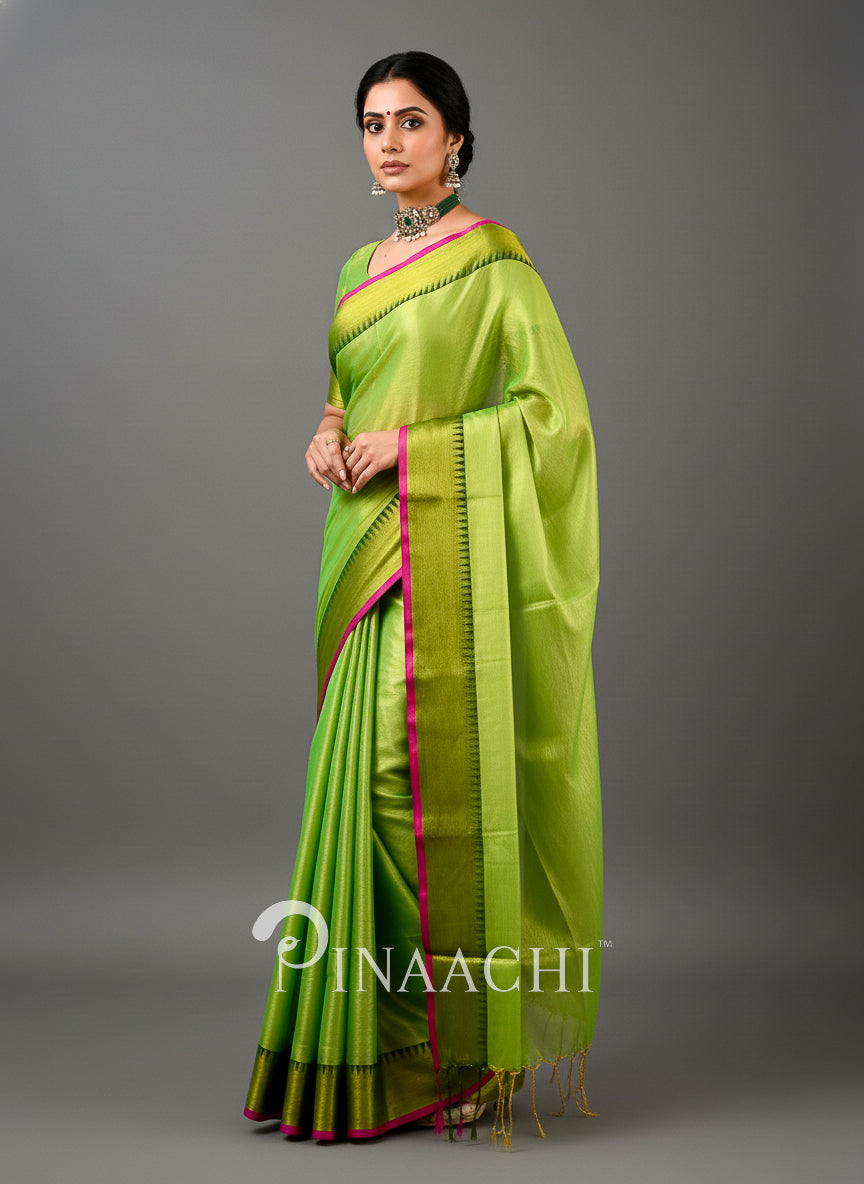 Pinaachi handloom tissue silk saree in vibrant green with pink borders and elegant drape for special occasions