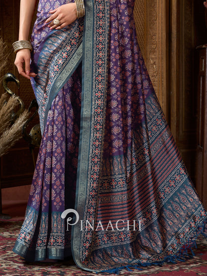 Pinaachi ajrak indigo silk saree featuring intricate patterns and elegant draping