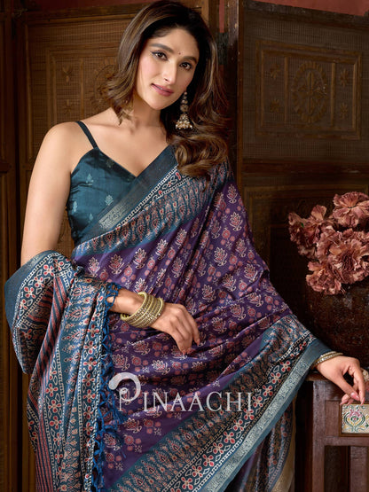 Pinaachi ajrak indigo silk saree with intricate floral patterns and elegant border design