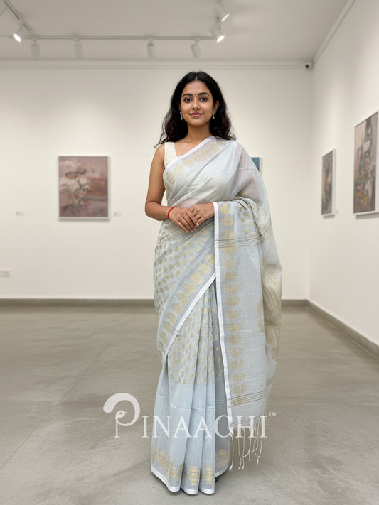 Pinaachi light blue handloom jamdani saree with intricate patterns and elegant draping