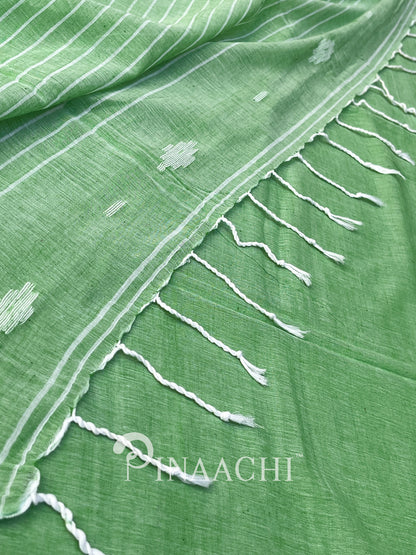 Pinaachi light green mulmul jamdani saree with intricate patterns and delicate fringes
