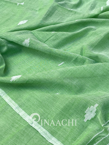 Pinaachi light green mulmul jamdani saree with delicate white motifs for elegant occasions