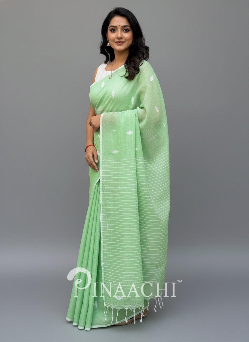 Pinaachi light green mulmul jamdani saree with elegant patterns and fine fabric
