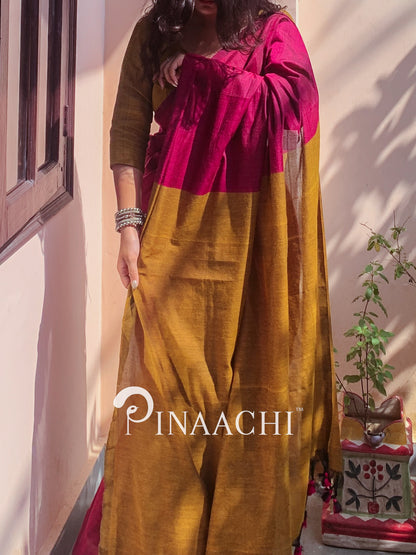 Magenta pink cotton handloom saree paired with a simple blouse for a chic look
