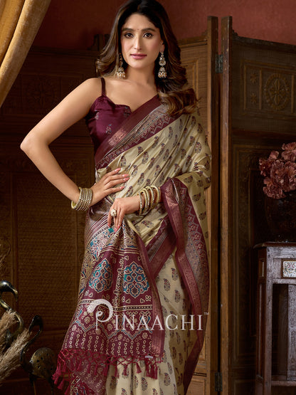 Pinaachi beige-red Ajrakh art silk saree with intricate patterns and elegant draping