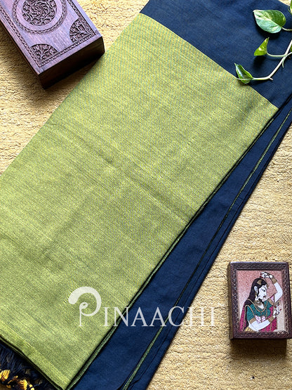 Olive green handloom cotton saree by Pinaachi with a contrasting navy blue border