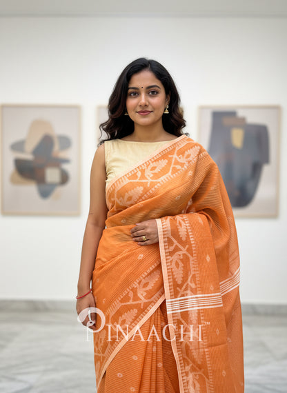 Pinaachi orange cotton silk jamdani saree with intricate designs and elegant drape