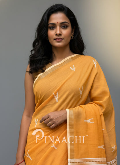 Pinaachi orange mulmul jamdani saree with intricate designs for a stylish look