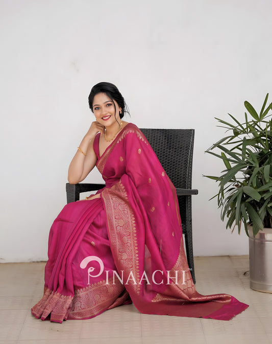 Pinaachi pink litchi silk saree with intricate gold detailing, perfect for festive occasions
