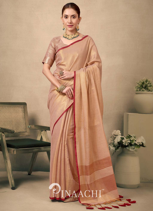 Elegant Pinaachi Pure Tissue Silk Saree in beige with red border worn by model with jewelry