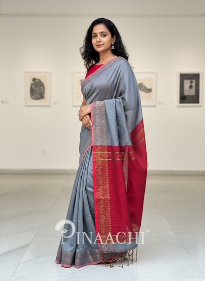 Pinaachi steel blue cotton silk saree with red borders and intricate detailing for elegant occasions