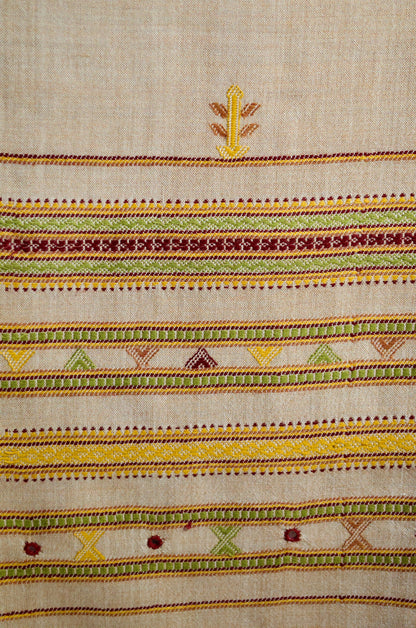 Elegant pure merino wool stole with vibrant hand-stitched patterns and rich colors