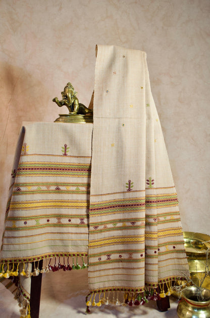 Elegant pure merino wool stole with intricate embroidery and tassel detailing, perfect for all seasons